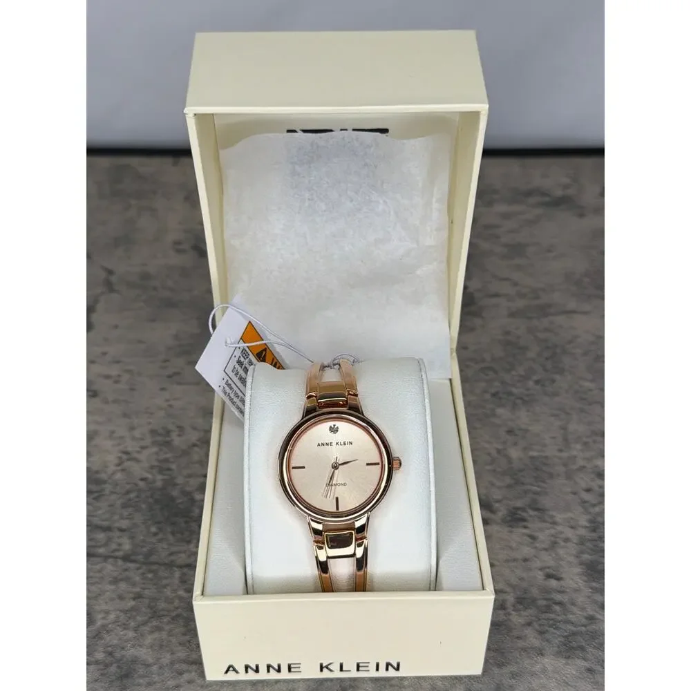 Anne Klein Women's Genuine Diamond Dial Bangle Watch- Rose Gold